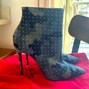 Christian Louboutin women's high heeled camouflage and crystal boots.